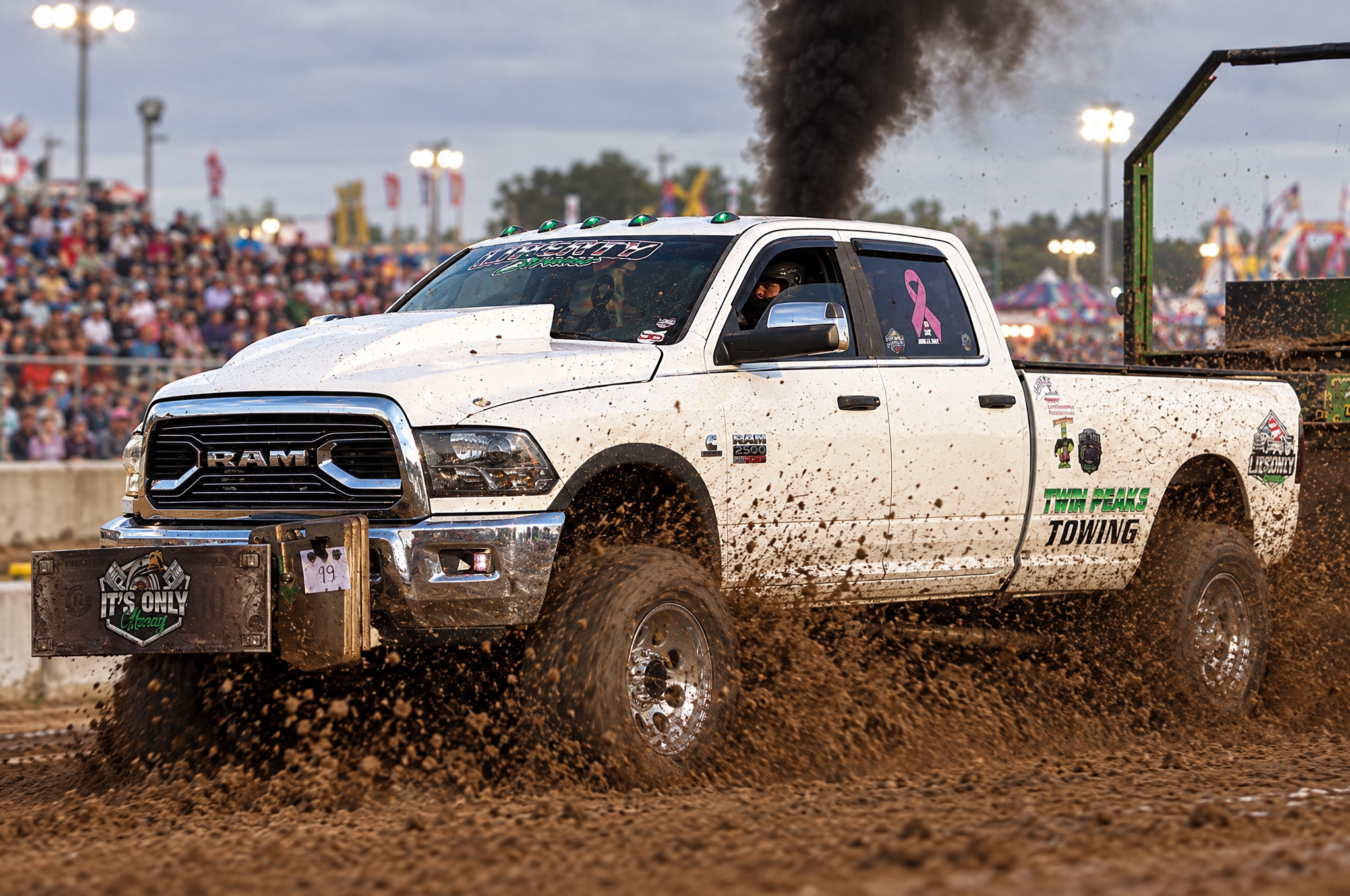 Liberty Diesel pulling truck under power on the track